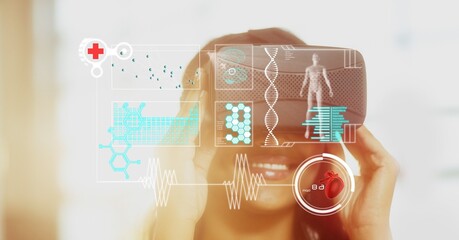 Composite image of digital interface with medical data processing against woman wearing vr headset