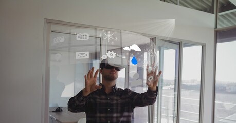 Composite image of digital interface with data processing against caucasian man wearing vr headset