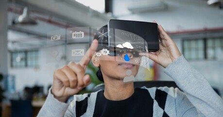 Digital interface with data processing against african american woman wearing vr headset