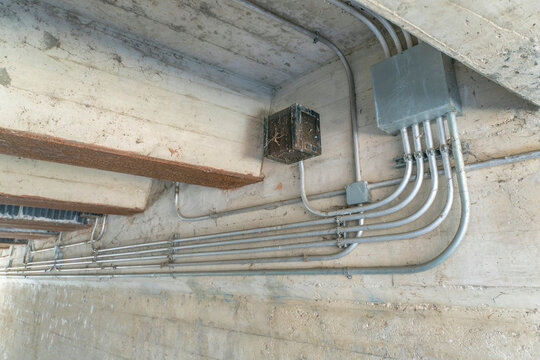 San Antonio, Texas- Electrical pipes under a bridge
