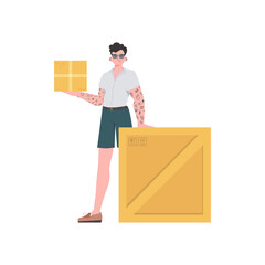 A man stands and holds a parcel. Delivery concept.