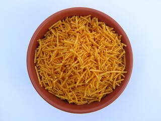 India snacks food Aloo bhujia in a bowl on white background