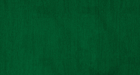 green carpet background texture, shot from above. texture tight weave carpet. elegant dark green...