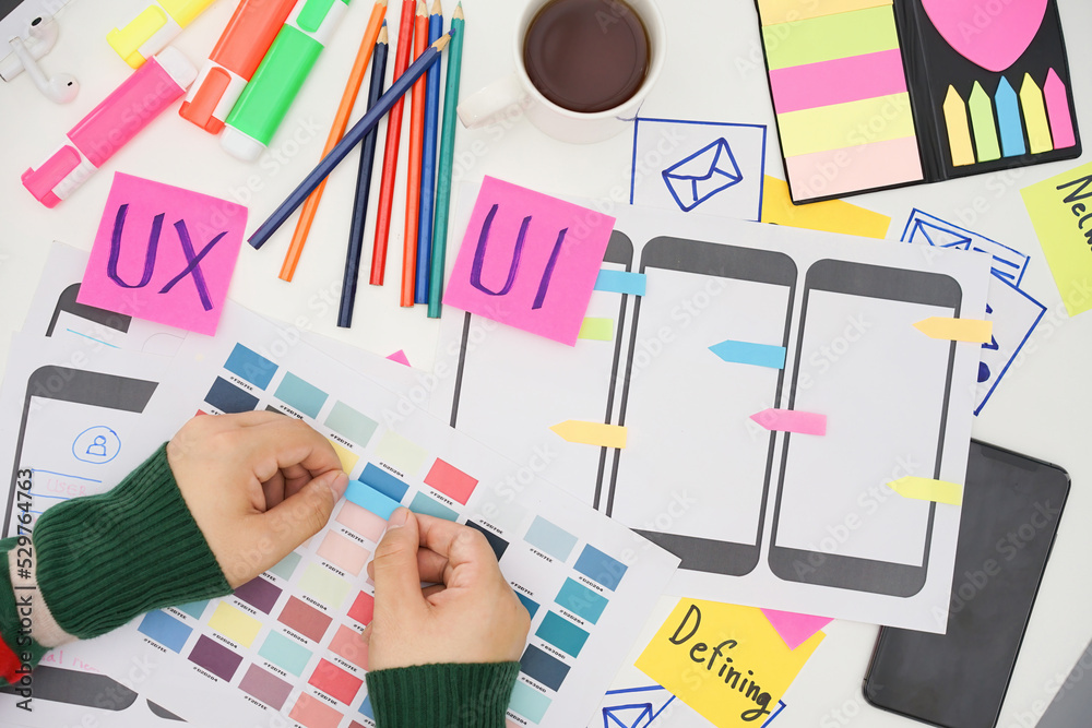 Wall mural creative top view photo of ux ui designer working space. user experience concept.