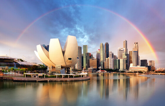 Singapore city with rainbow in Marina during dramatic sunset