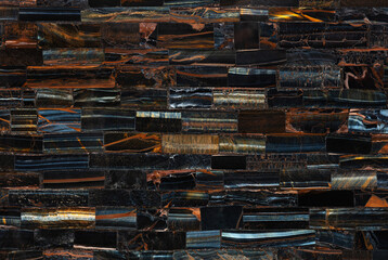Naklejka premium Tiger Eye Blue slab. Polished semiprecious stone for ceramic wall and floor digital tiles. Exclusive luxury gemstone background. Material for unique interior, exterior design decoration.