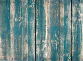 Planche en bois et peinture bleu vieillie.