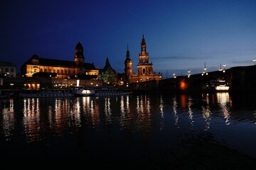 Scenic night shot of Dresden cityscape with lights and beautiful architecture
