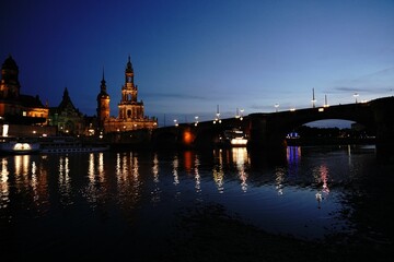 Scenic night shot of Dresden cityscape with lights and beautiful architecture