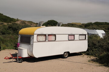 An old large caravan at a campsite