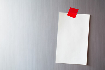 Abstract of Blank paper note on refrigerator door. sticker note