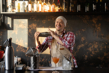 Barman at work, preparing cocktails. concept about service and beverages.