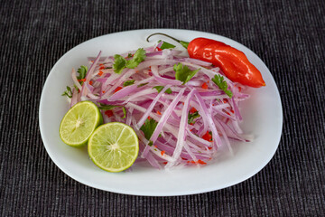 Salsa criolla, Peruvian dressing with red onion, chili pepper and lime