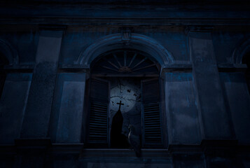 Bird stand on old damaged window with wall over cross, church, dead tree and spooky cloudy sky, Halloween mystery concept
