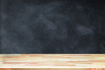 Wooden plank table for graphic stand product, interior design or montage display your product with blank texture blackboard with chalk for background. education concept.