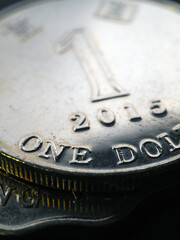 1 Hong Kong dollar. Fragment of textured coin. Vertical illustration about economy or finance. Coins and money of Hong Kong. News about banks and currency. Macro