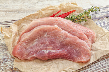 Raw pork schnitzel for roast