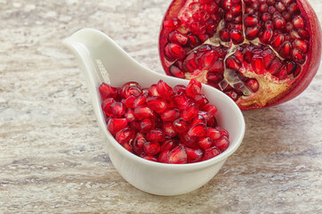 Ripe red Pomegranate seeds in the bowl