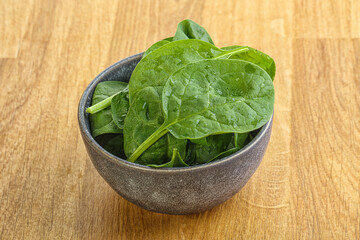 Fresh green spinach leaves in the bowl