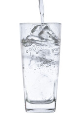 pour water in glass with ice  isolated on white background clipping path