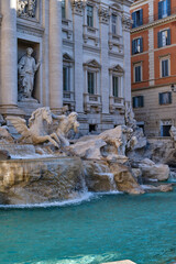 Fototapeta na wymiar A detail view of the Trevi Fountain in the morning - no people. Tourist attraction in Rome.