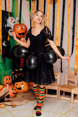 Fototapeta premium Young Sexy Funny Witch on Halloween Party