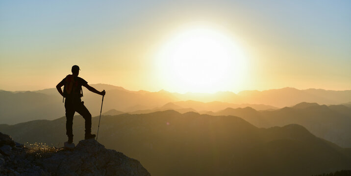 Mountaineer Facing Spectacular Sunset View