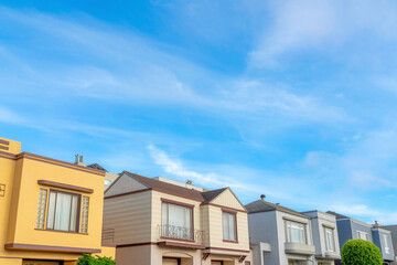 Suburbs houses with colorful exterior against the sky in San Francisco, California