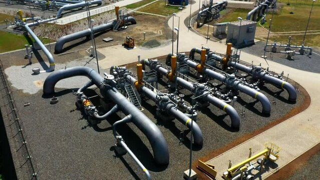 Natural gas pipeline. One part of Nord Stream pipeline from Russia to European Union. High pressure pipes on a hot summer day.	