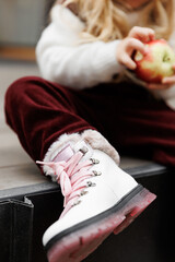 Children's foot in shoes close-up