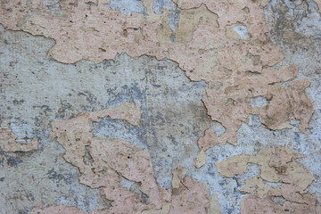 Obraz na płótnie Canvas Old concrete wall with peeling paint, texture