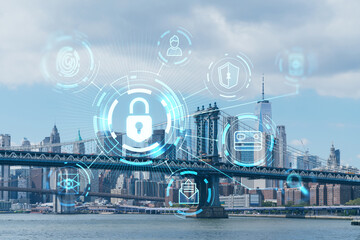 Brooklyn and Manhattan bridges with New York City financial downtown skyline panorama at day time over East River. The concept of cyber security to protect confidential information, padlock hologram