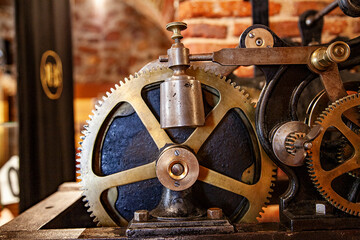 old clock machinery with weight