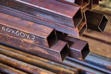 Square tubing on blurred background in cold warehouse