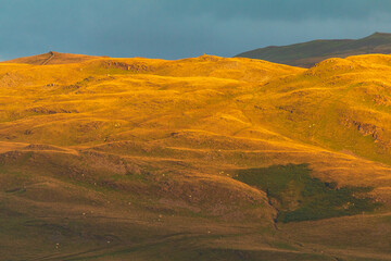 Fototapeta na wymiar Sunset over green hills in North UK.