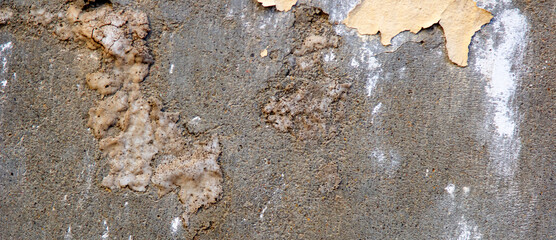 Old concrete wall with paint residue, texture