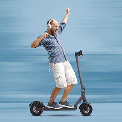 Man riding a scooter hands free and dancing