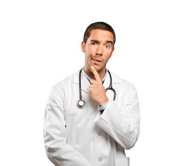 Fototapeta premium Suspicious doctor against white background