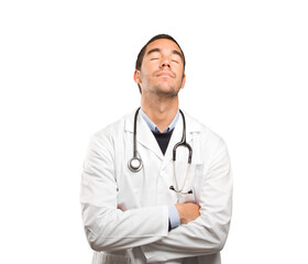 Fototapeta premium Depressed doctor against white background