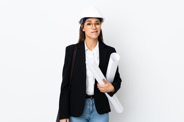 Young architect caucasian woman with helmet and holding blueprints over isolated background having doubts and with confuse face expression