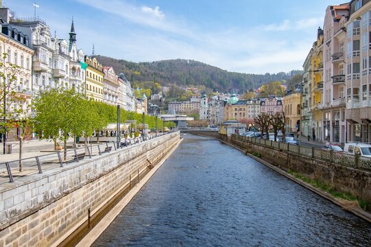 Outdoor view of buildings and the Tepla River in the city of Carlsbad in the Czech republic