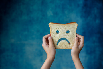 diet celiac gluten free bread in the hands of a child - obrazy, fototapety, plakaty