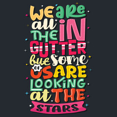 Fototapeta na wymiar we are all in the gutter but some of us are looking at the stars, Hand-drawn lettering beautiful Quote Typography, inspirational Vector lettering for t-shirt design, printing, postcard, and wallpaper 