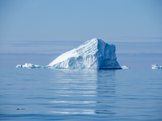 Giant icebergs just off the coast of Disko Island,  near Qeqertarsuaq, Disko Bay, Western Greenland