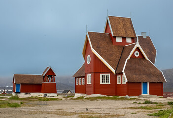 The charming church of Qeqertarsuaq (formerly Godhavn) on the south coast of Disko Island, Western Greenland.