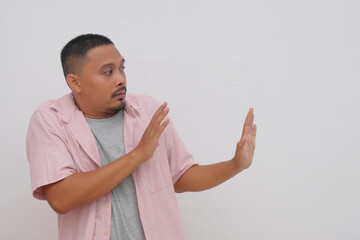 portrait of man rejecting on something