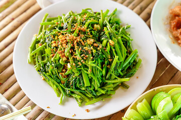 Vietnamese stir fired water spinach with garlic