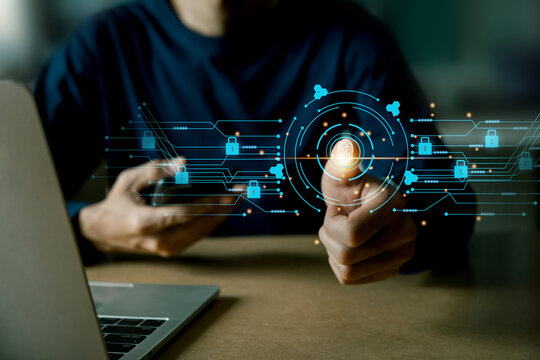businessmen Fingerprint scanning and biometric authentication, processing of biometric for access personal data , cybersecurity concept .