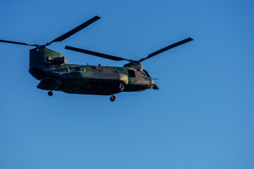 Military helicopter in flight