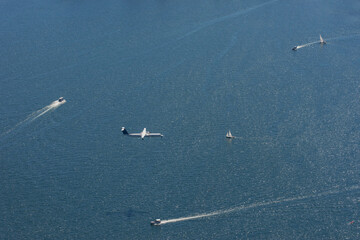 Arial view on plane and boats